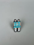 Shining twins pin